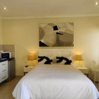Bell Luxury Suite Bedroom at Andante Lodge in Pretoria East